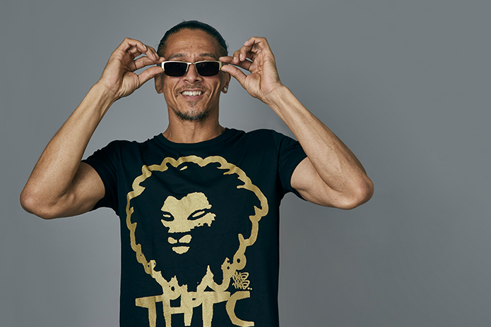 Chelone Wolf wearing THTC Gold LionT-Shirt